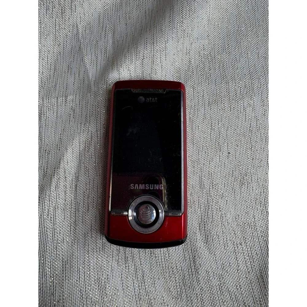 red Samsung SGH-A777, a 3G slider phone